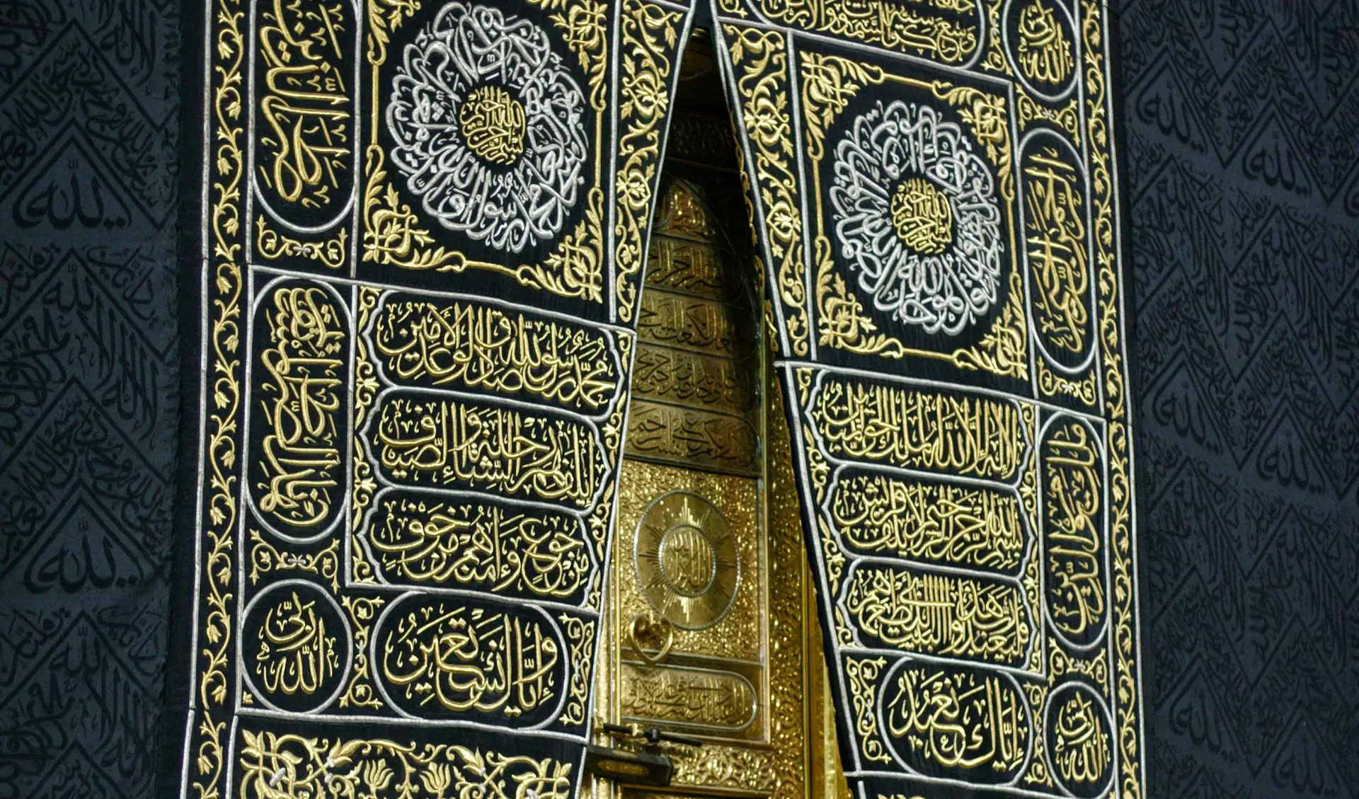 The gold door of the Kaaba set in the black Kiswah