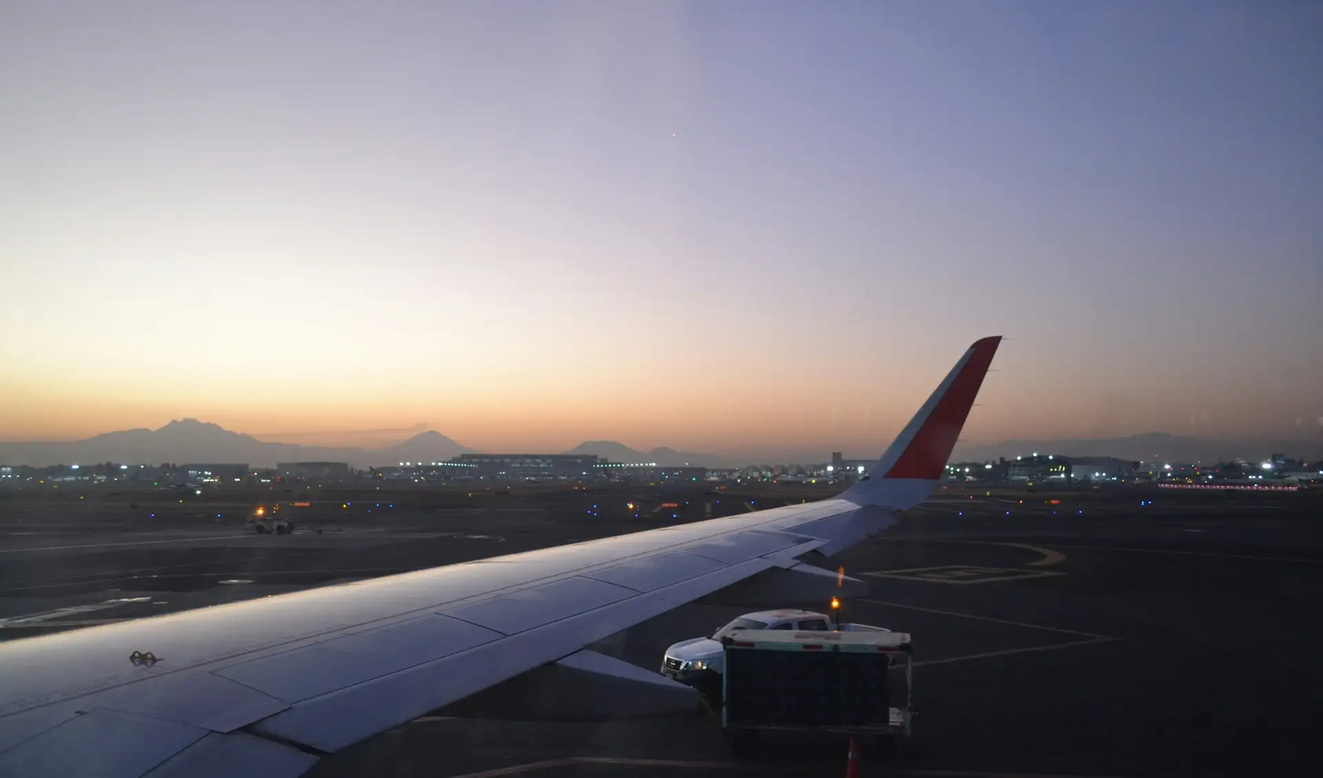 An aircraft wing at dawn